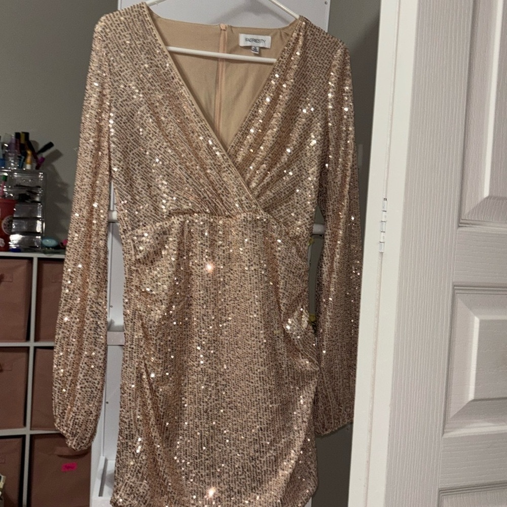 Surplice Neck Lantern Sleeve Sequin Bodycon Dress Color: Apricot
Faeriesty